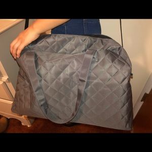 Giant grey duffle bag